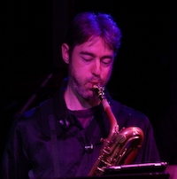 Greg playing saxohpone